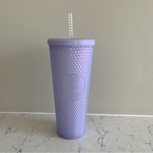 Purple studded Starbucks cup venti